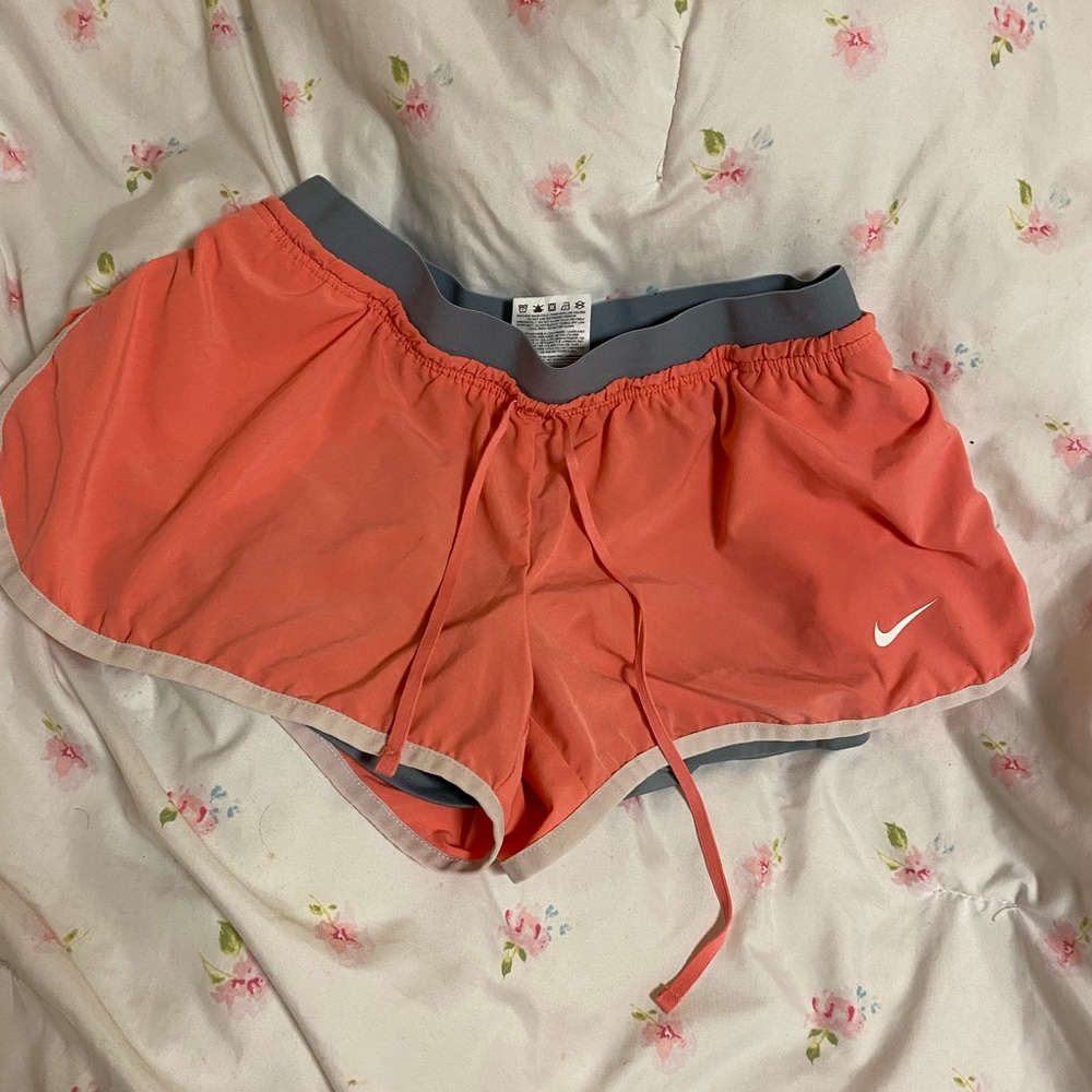 Pink Nike shorts
